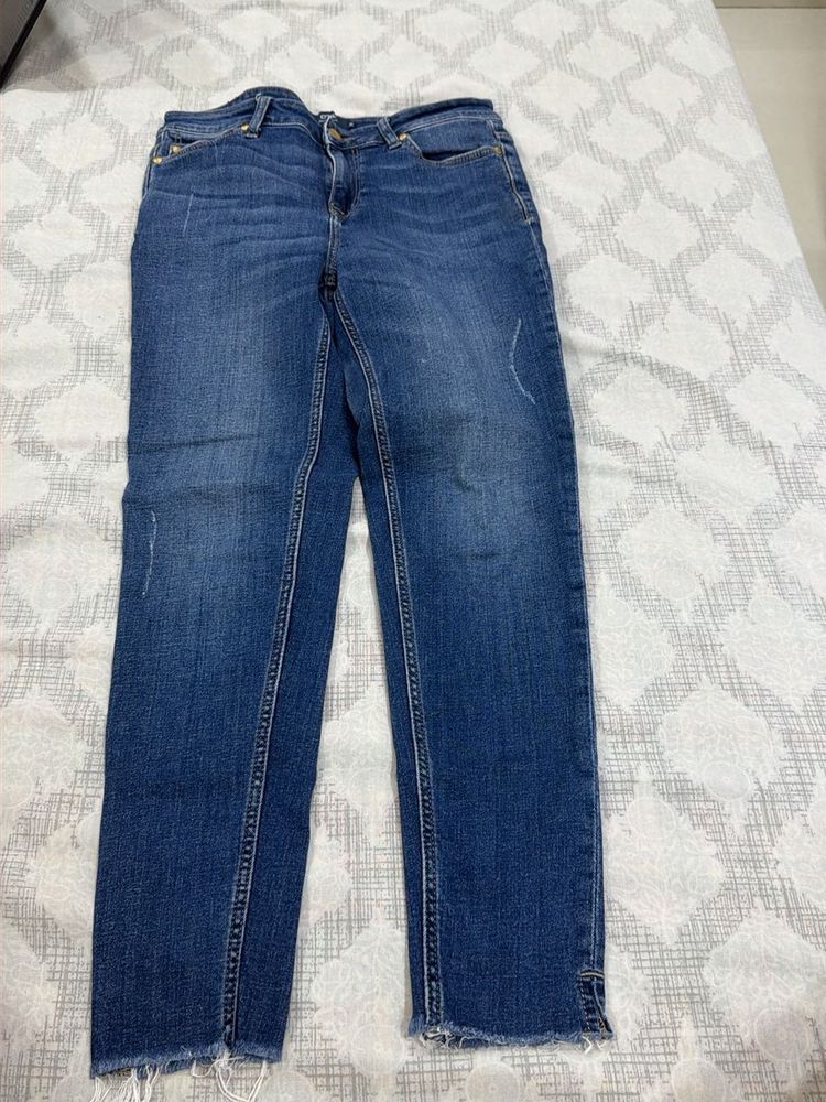 Blue Distressed Denim Jeans