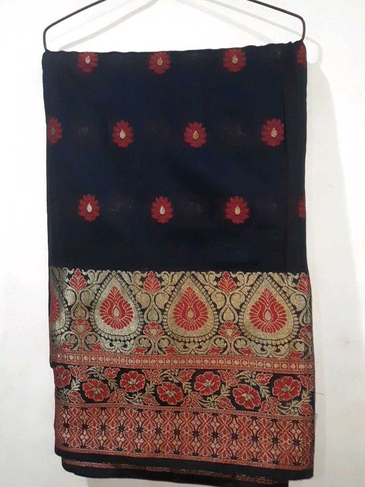 Elegant Black Saree with Red &amp; Gold Border.