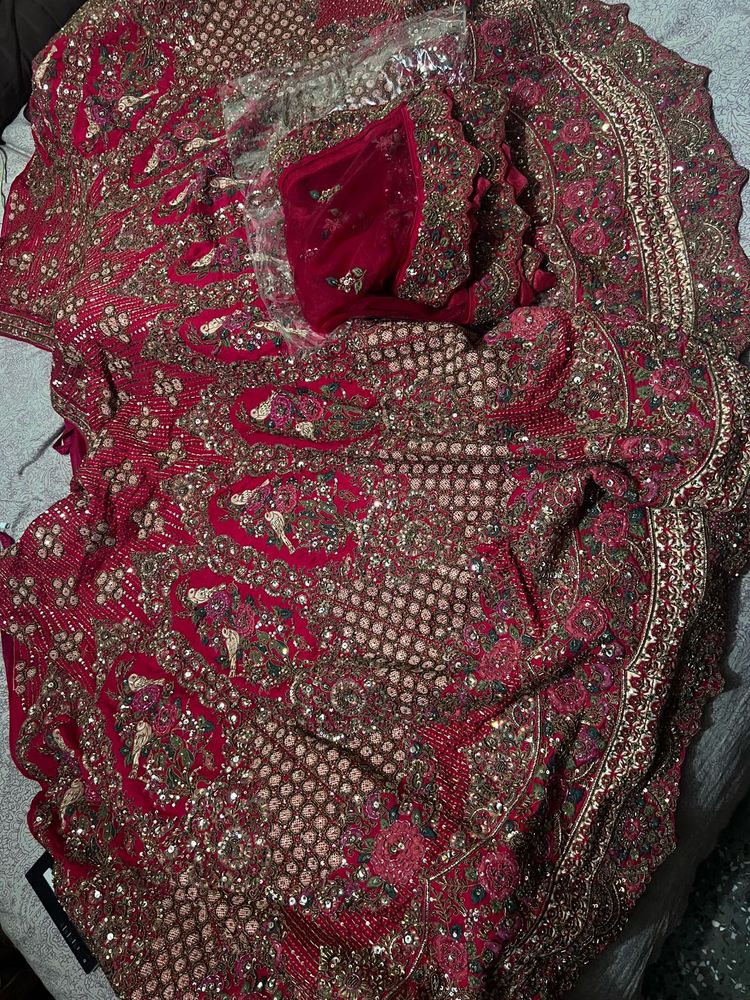 Luxury pure handwork Bridal Lehenga..