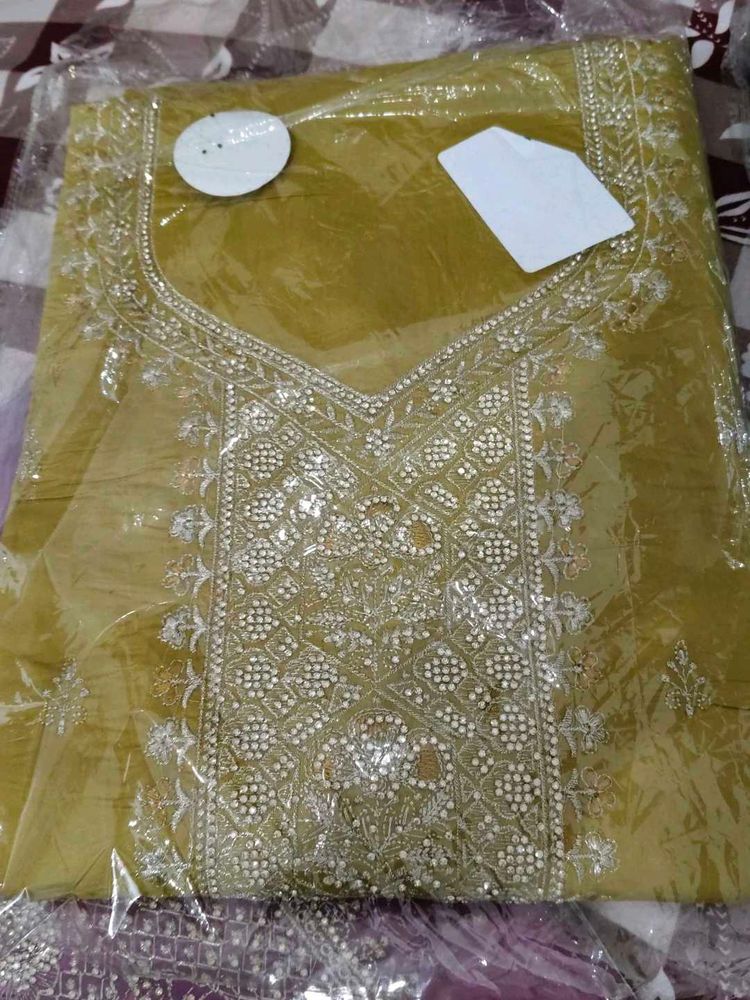 Embroidered and jourkan work Kurta Set