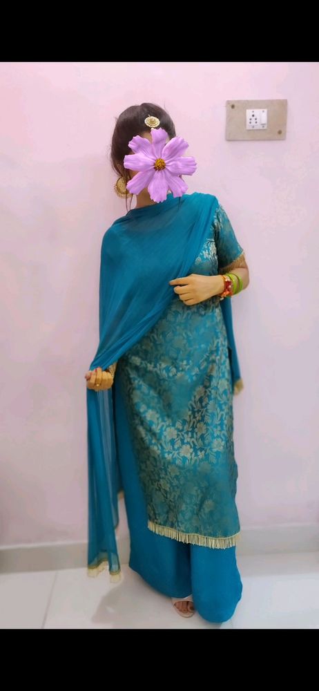 Boutique stiched firozi suit