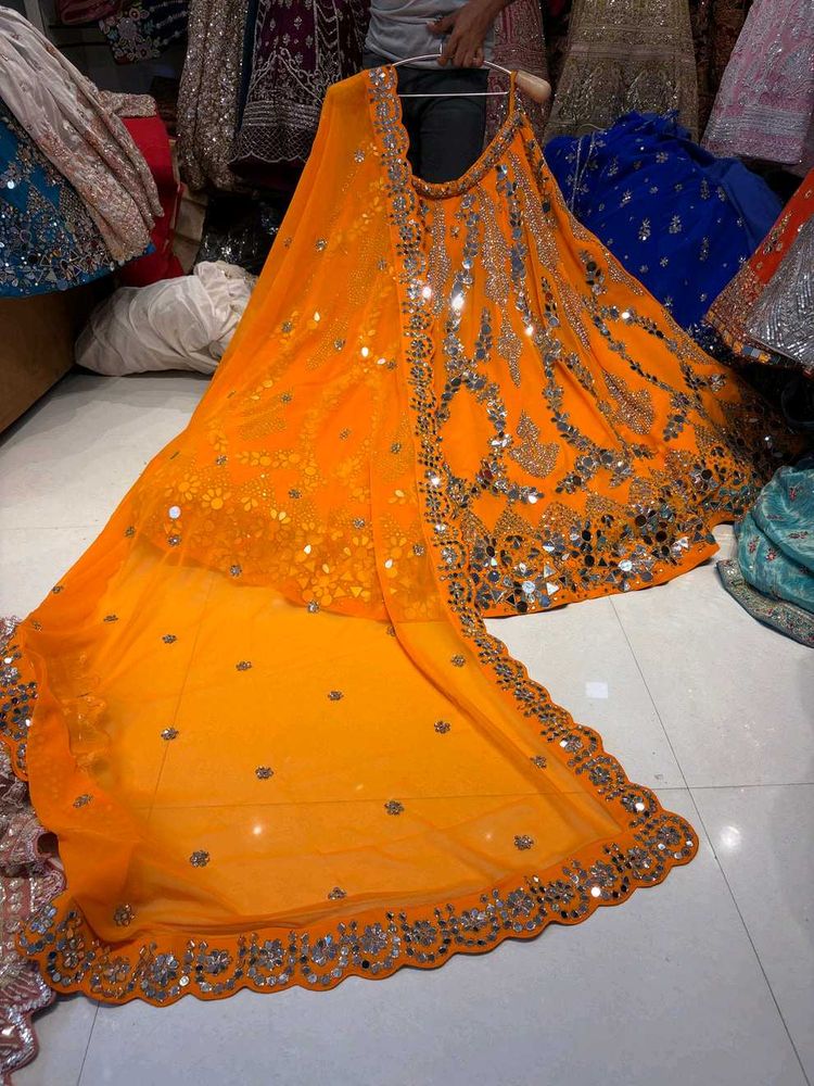 Stunning Orange Sequined Lehenga Set