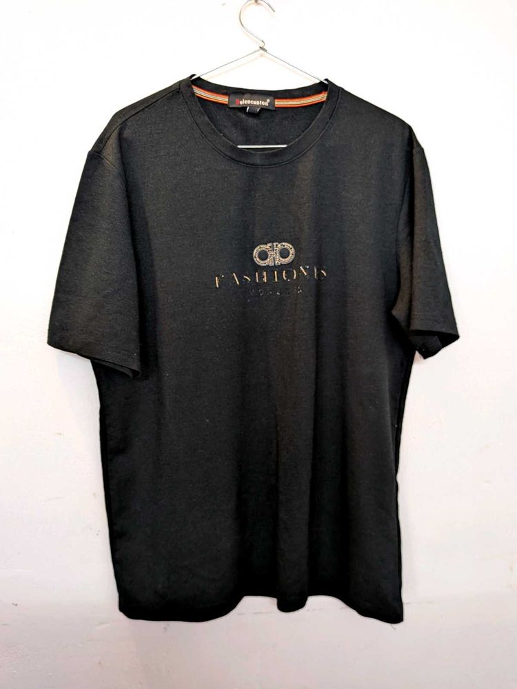 Stylish Black T-Shirt with Gold Emblem