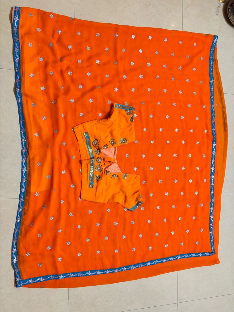 Vibrant Orange Saree with Blue Border
