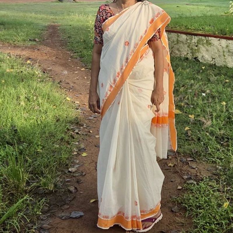 Elegant Kerala Saree with Orange Border