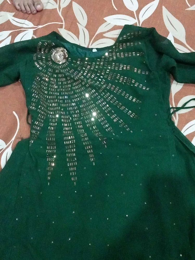 green colour long gown ....  mirror work