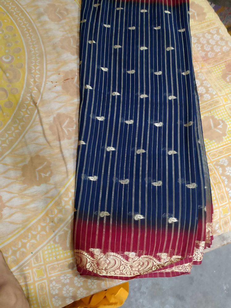 Elegant Navy Blue Saree with Gold Embellishments