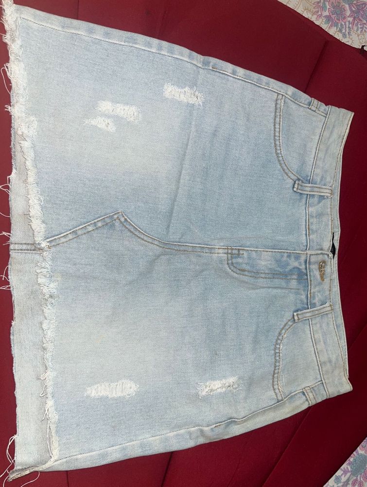 Light Wash Ripped Denim Skirt