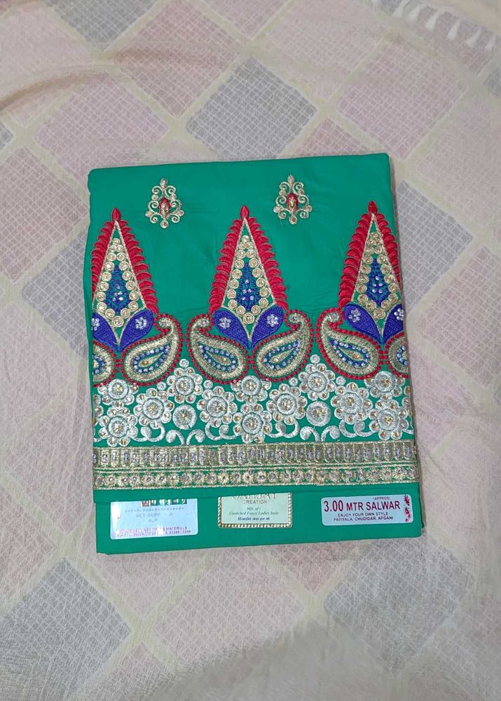 Green  Dress Material with salwar and net dupatta