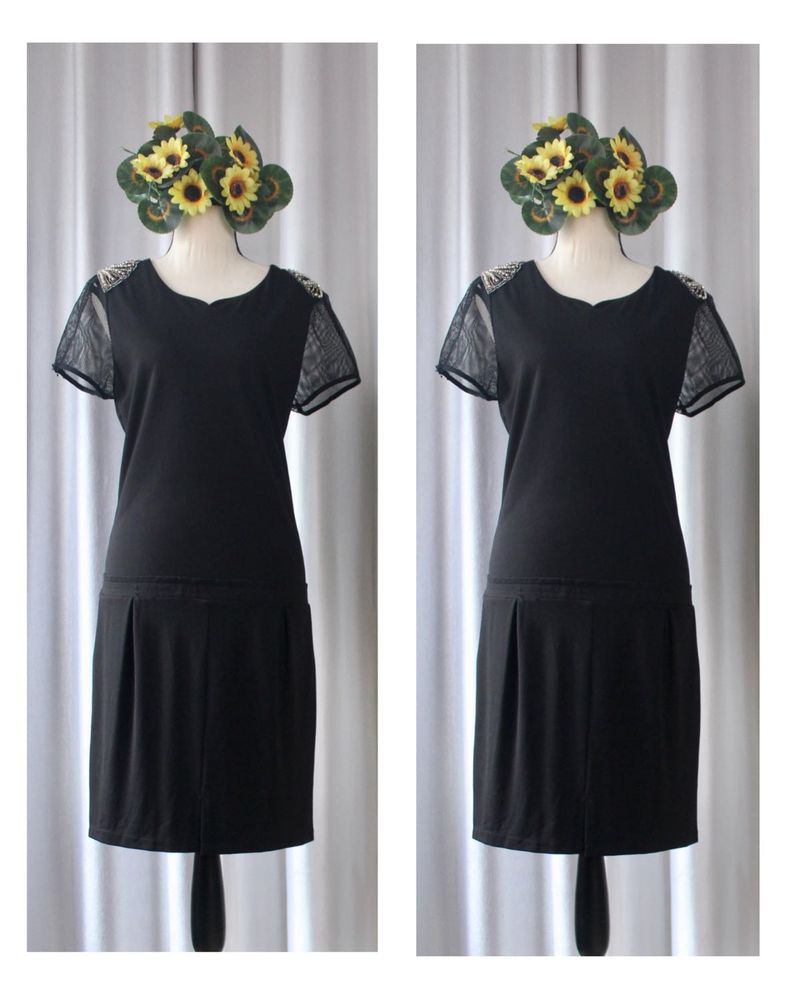 Chic Black Dress with Sheer Sleeves