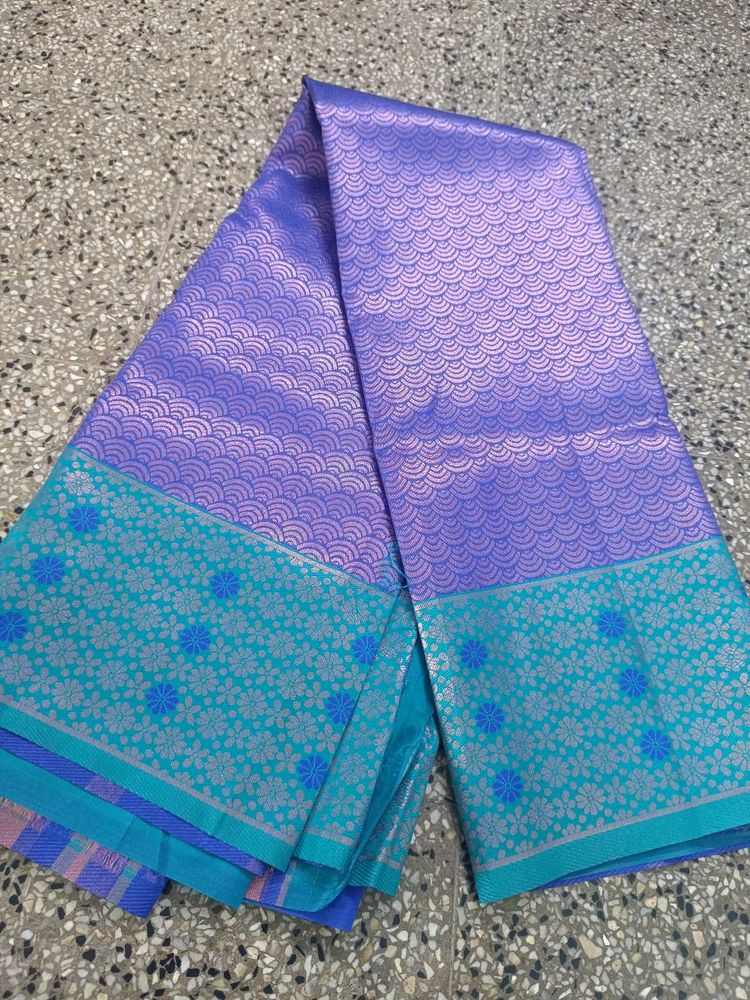 Beautiful blue Saree with Teal Border