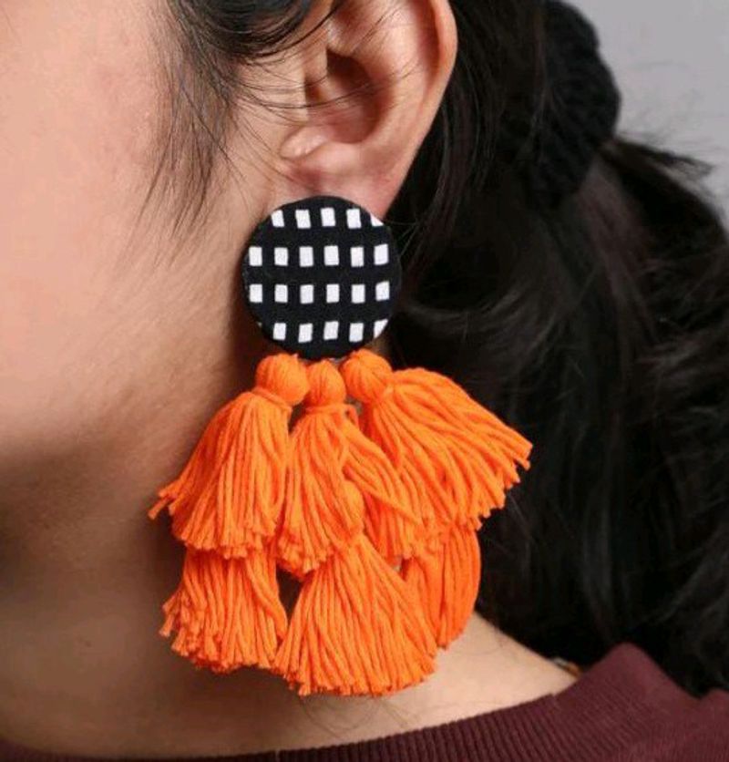 Orange tassel earrings