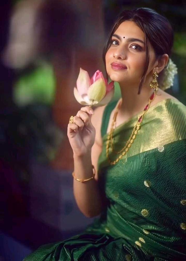 Elegant Green Saree with Gold Border