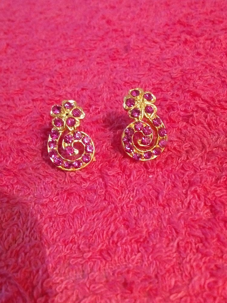 Gold Colour Stud With Magenta Stones