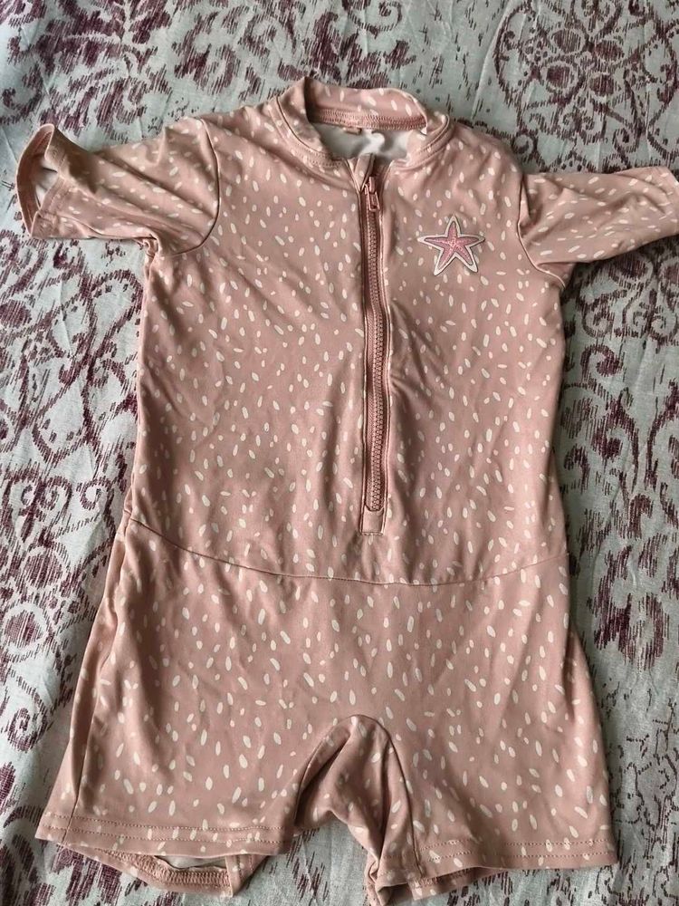 Cute Pink Swimsuit with Star Detail