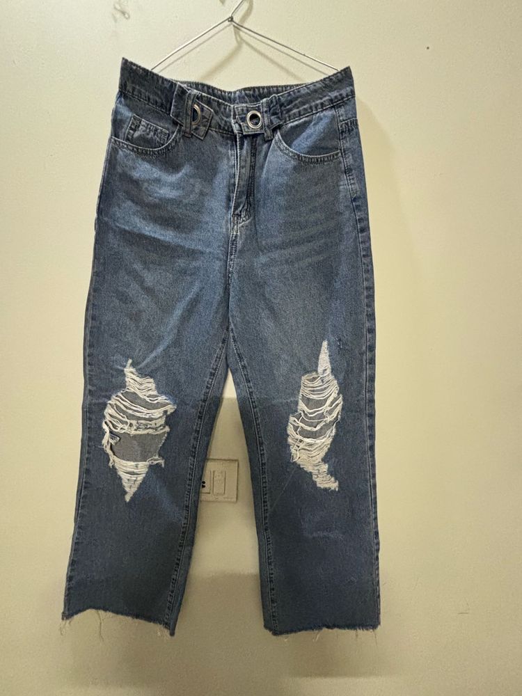 Distressed Blue Denim Jeans