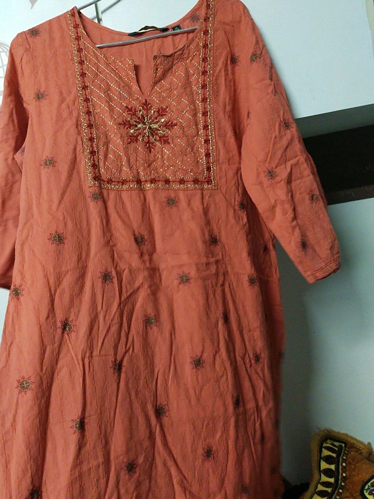 Orange kurti , breast size 38 , waist 34 , hips 38