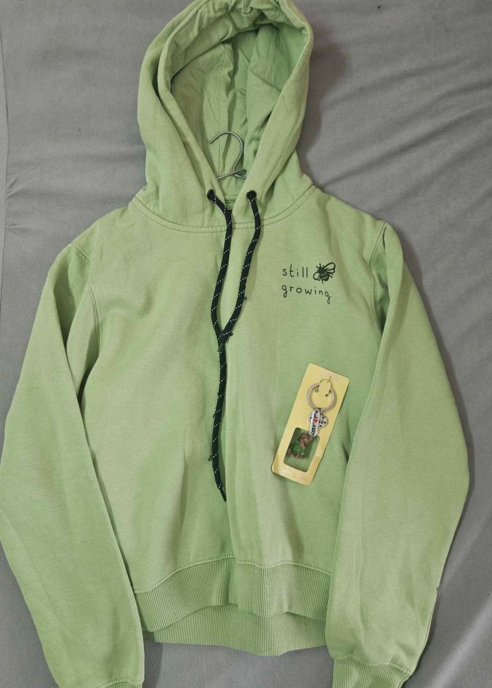 "Still Growing" sweatshirt with free keychain
