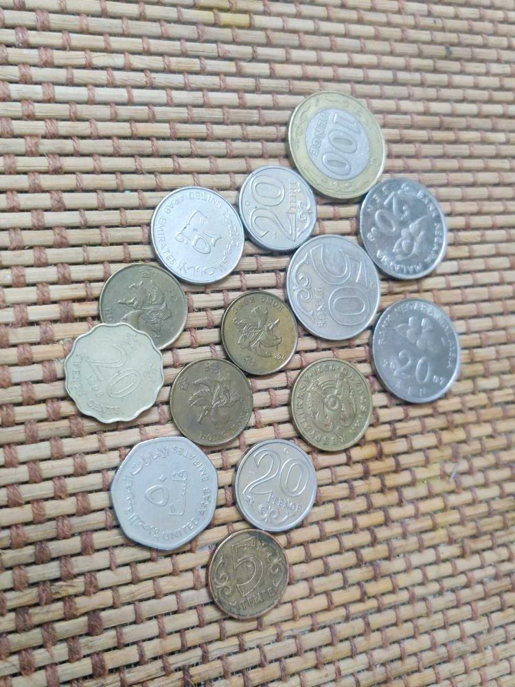 Collection of Assorted Coins from 4 countries .