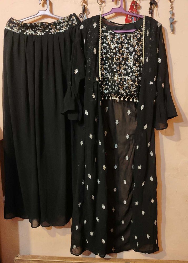 Black Sequin sarara set with shrug.