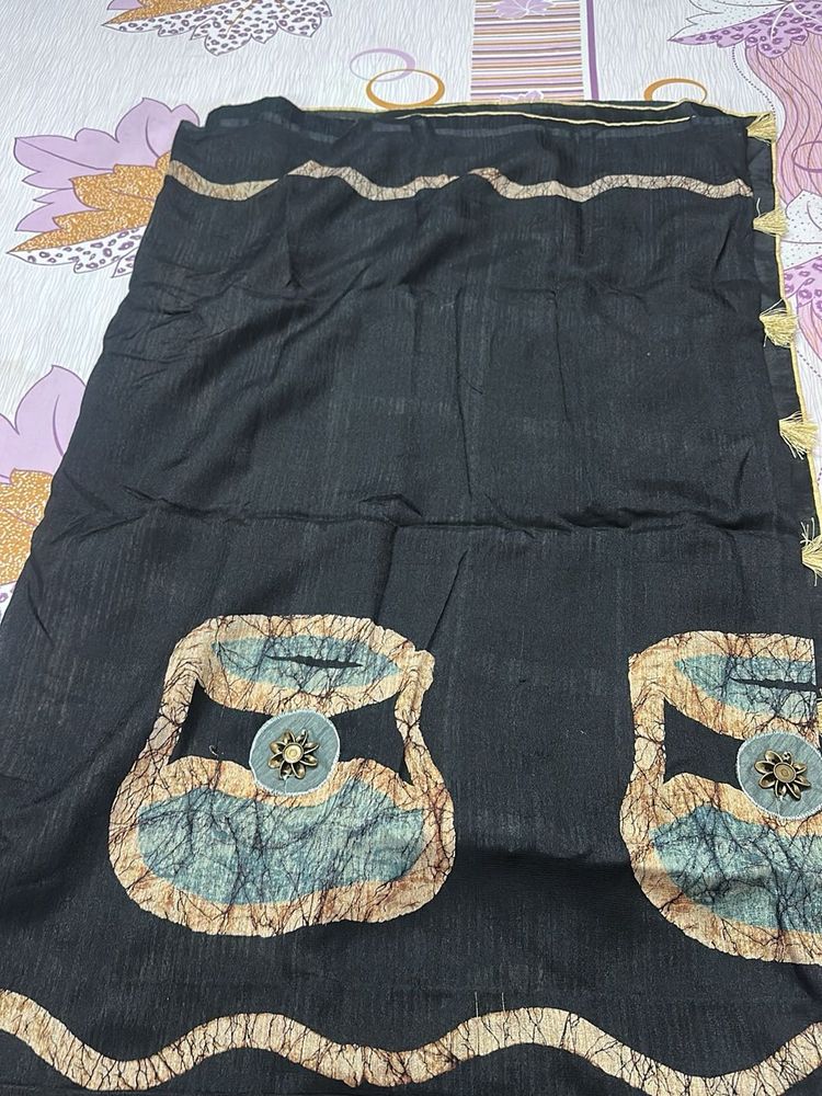 Elegant Black Saree with Unique Print