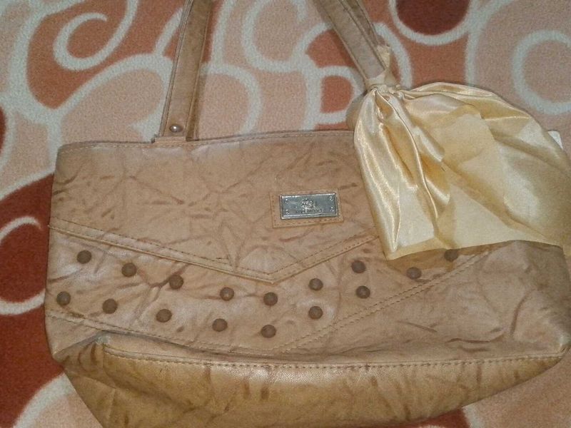 Stylish Tan Shoulder Bag with Scarf Accent