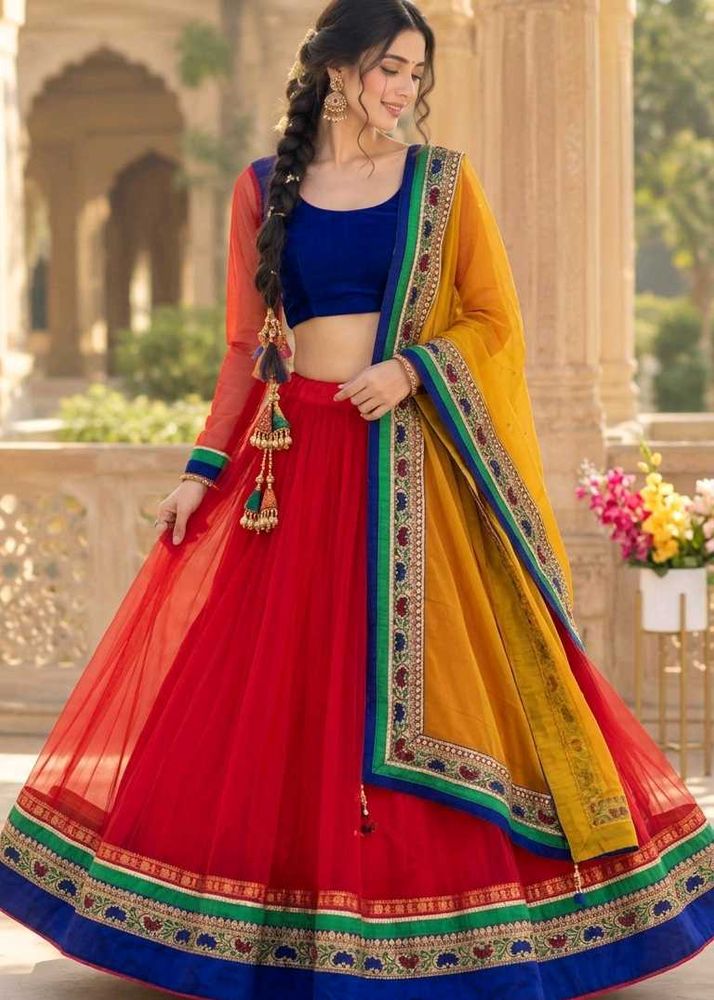 Red Net Lehenga Choli with Blue Blouse