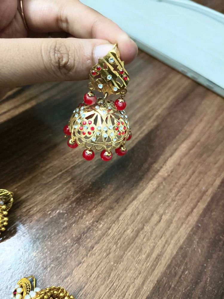 Elegant Jhumka Earrings with Red Beads