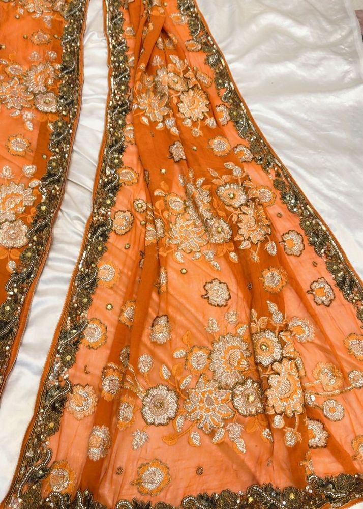 Stunning Orange Embroidered Saree
