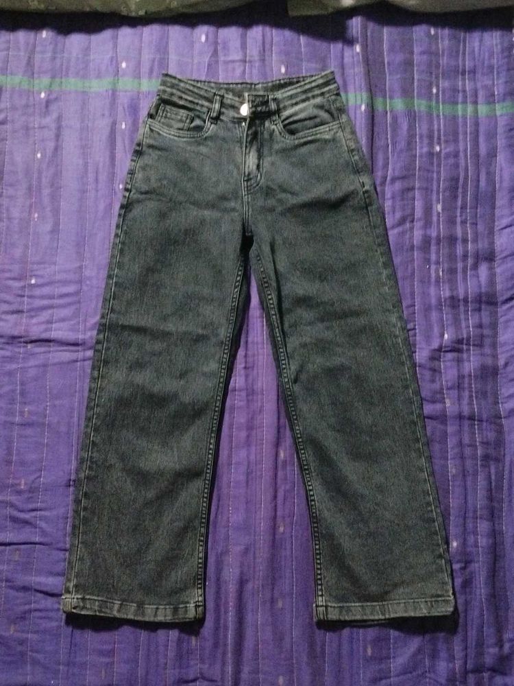 A charcol colour jeans with comfortable material.
