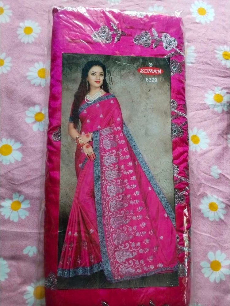 Elegant Pink Saree with Intricate Detailing