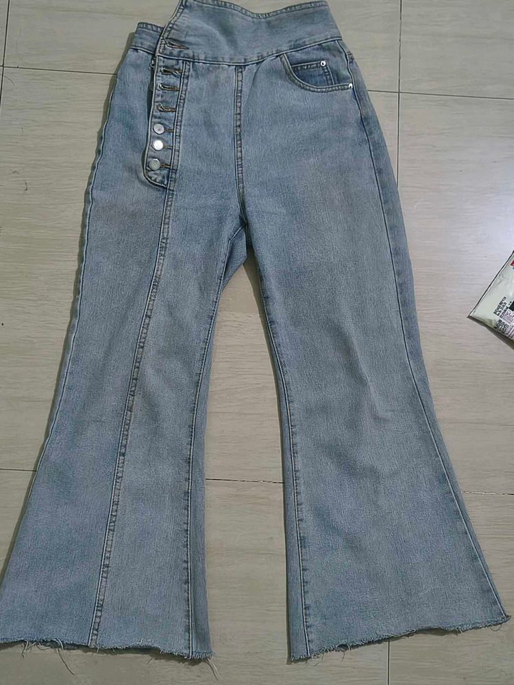 Light Wash Flared Jeans with Button Detail