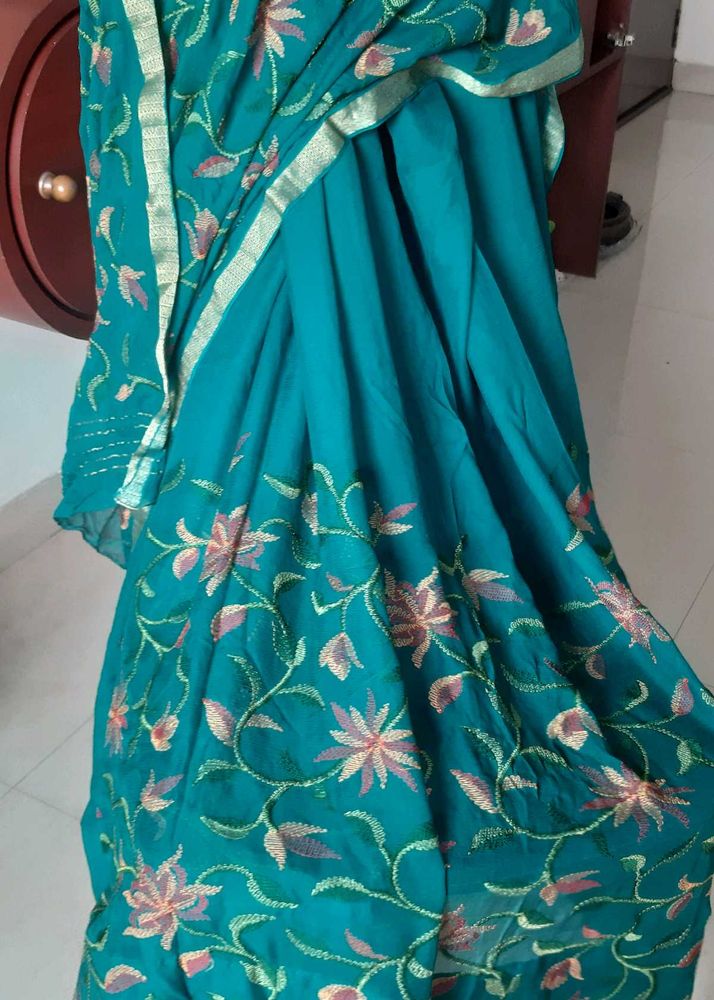Teal-Green elegant embroidered saree