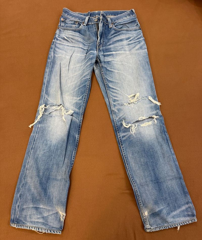 Distressed Blue Denim Jeans