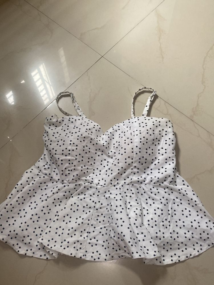 White Peplum Top With Polka Dots