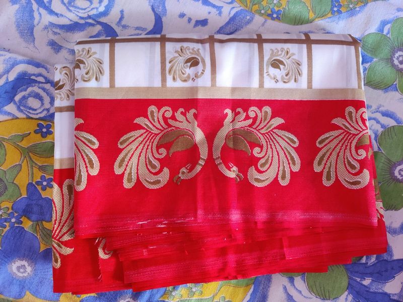 Beautiful white saree and red border with golden p