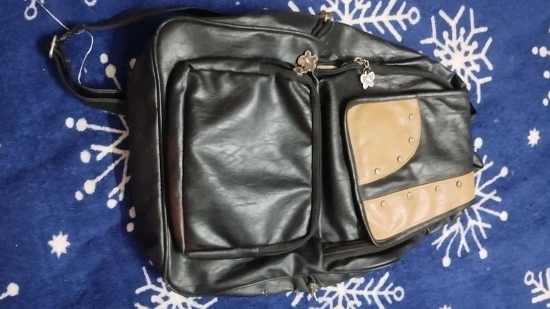 Stylish Black Crossbody Bag with Tan Accents