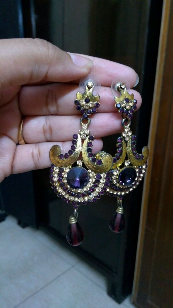 Heavy earrings