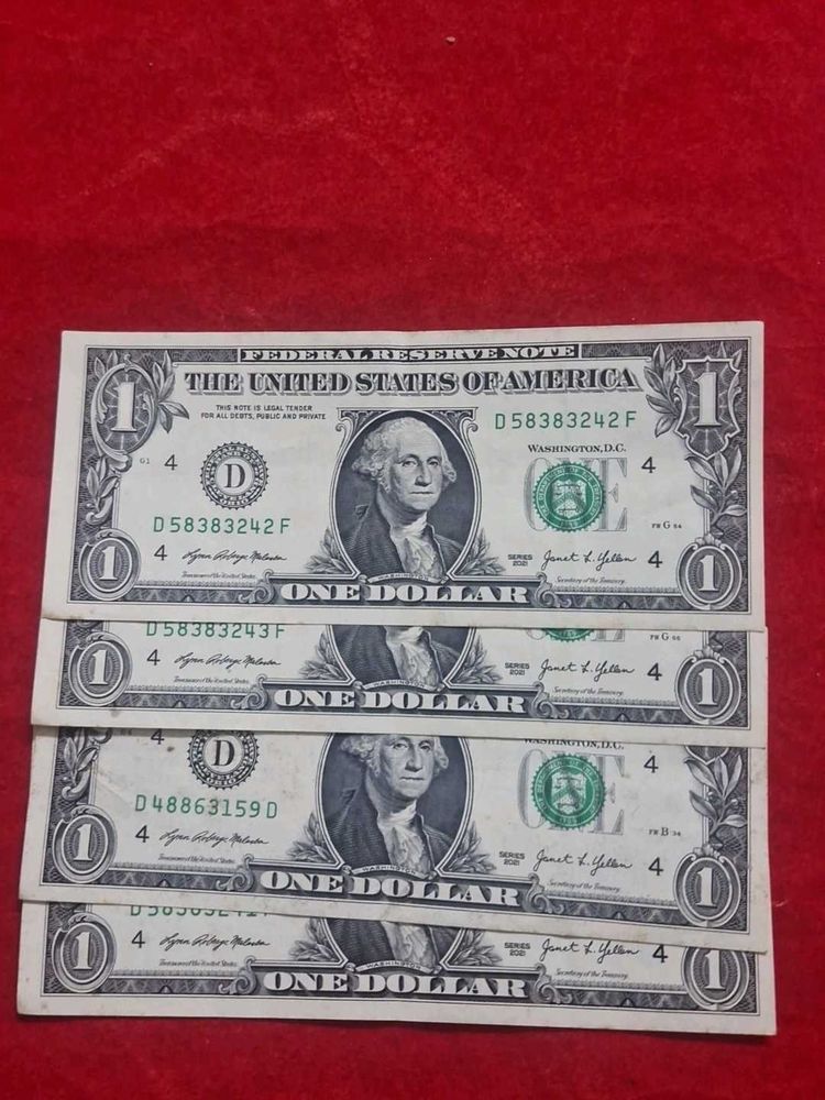 Four US Dollar Bills