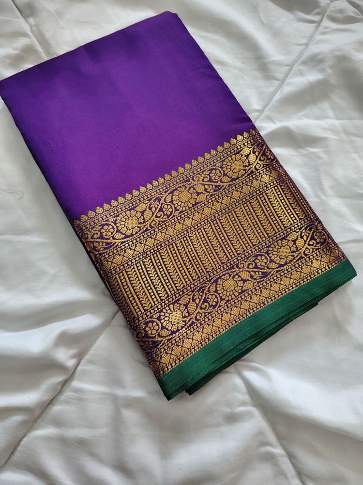 Elegant Purple Saree with Gold Border