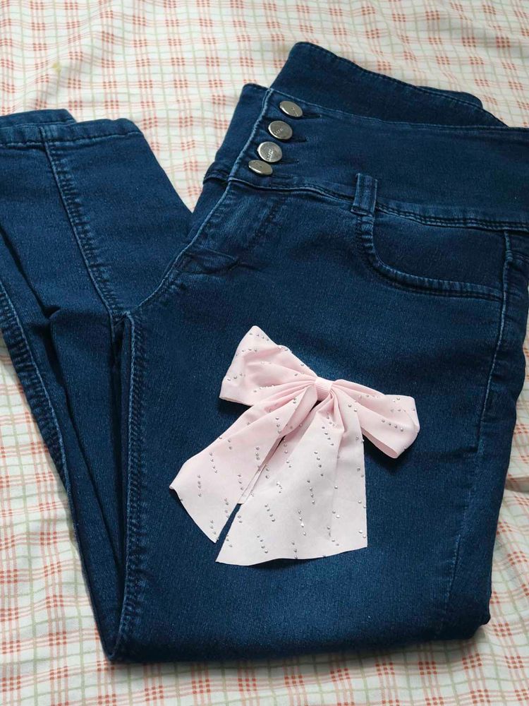 High-Waisted Dark Wash Jeans with Button Detail