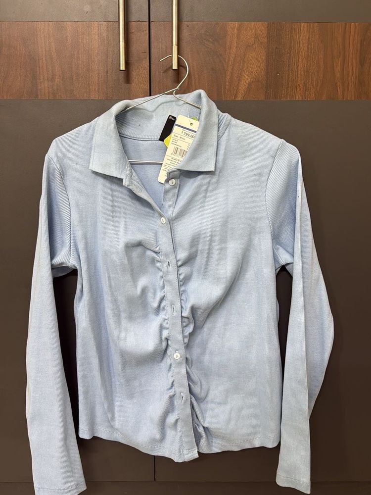 powder blue shirt