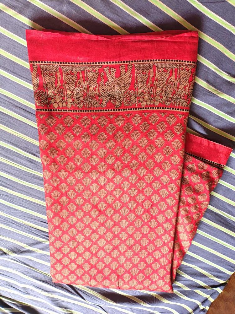 Vibrant Red Saree with Intricate Gold Print