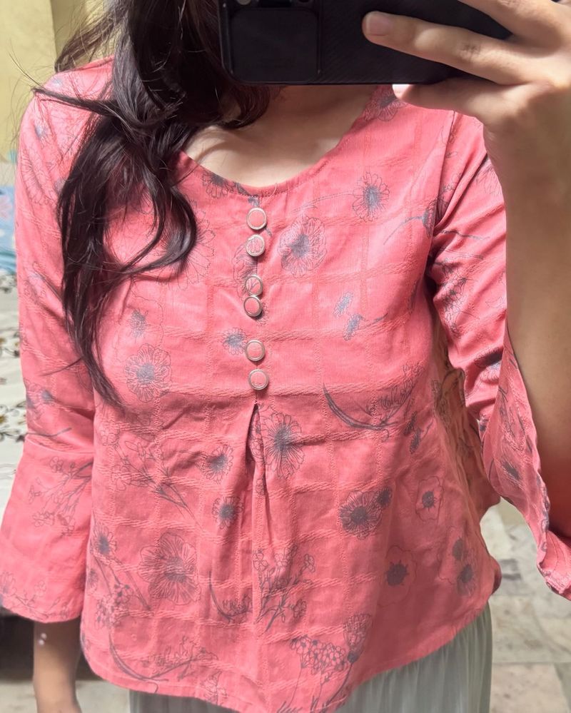 Peach peplum top