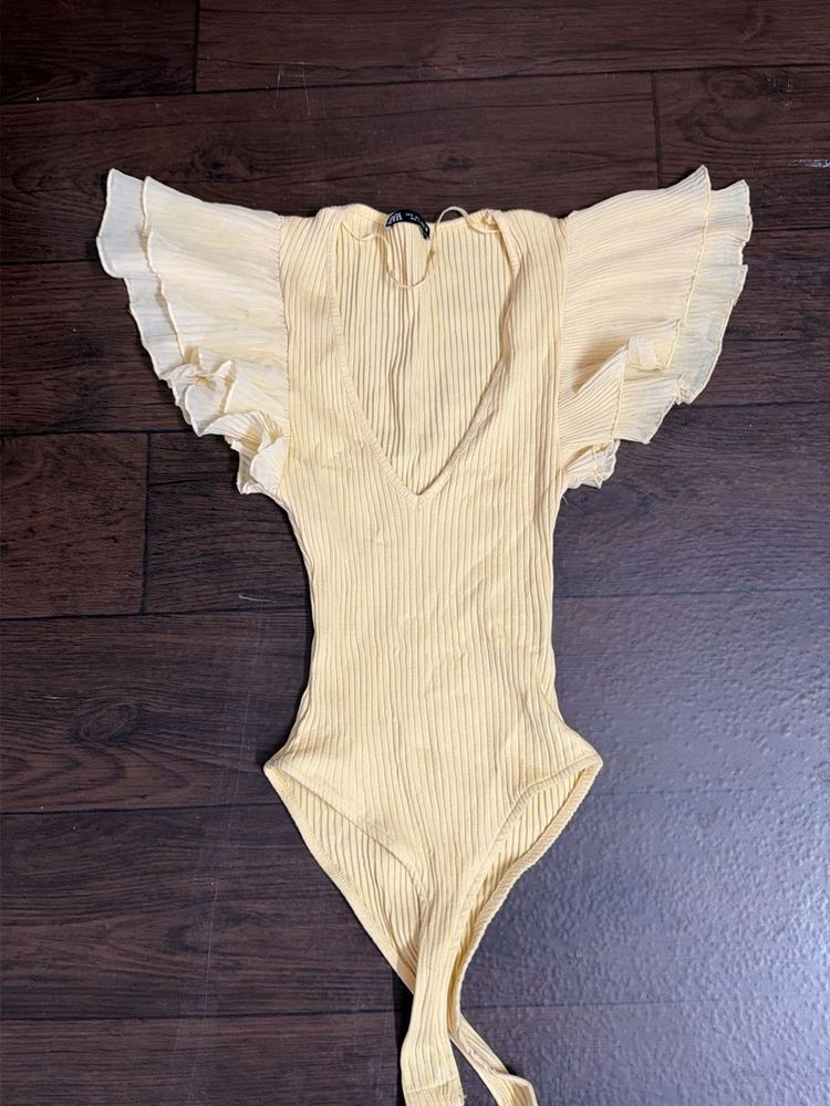 Sheer Sleeve Ribbed Bodysuit