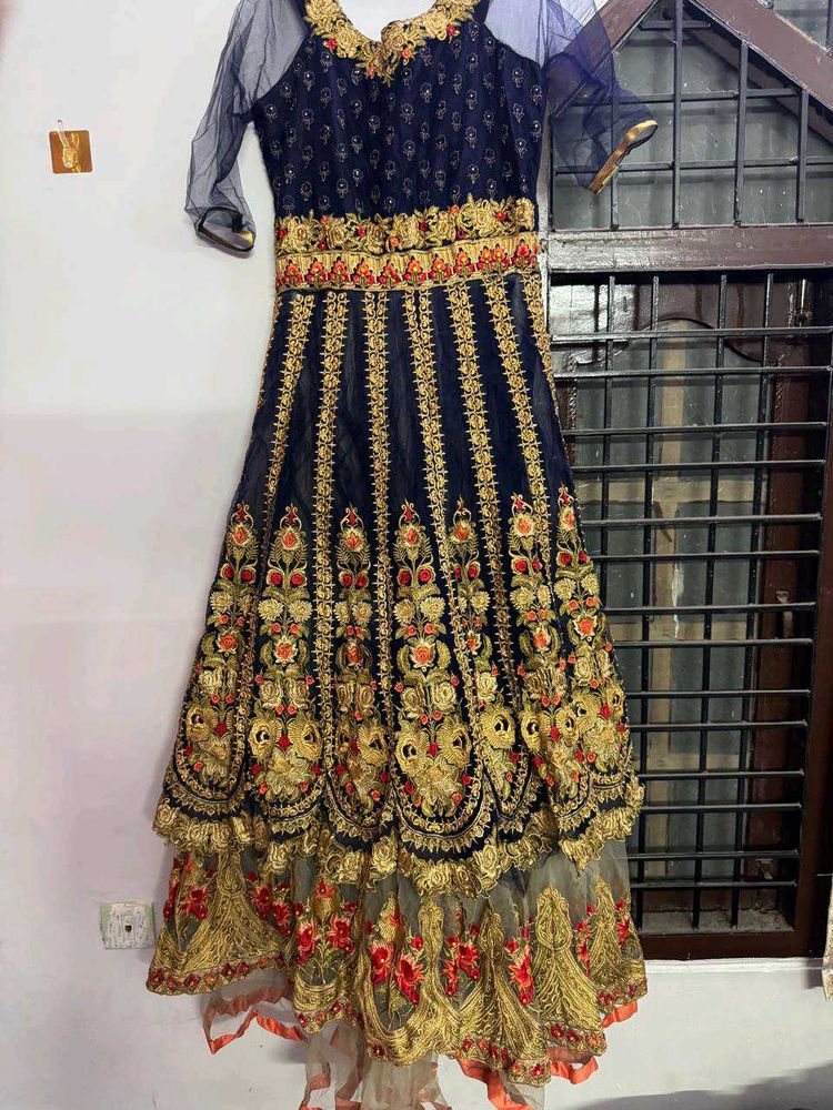long heavy tail cut dress with intricate embroider