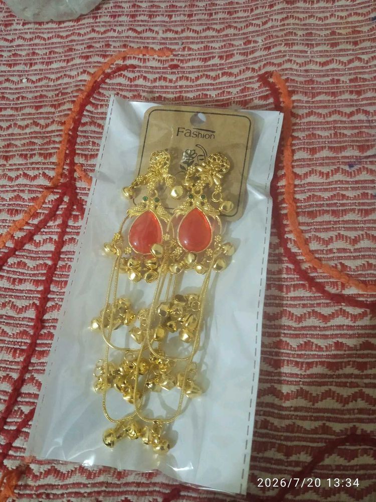 Golden Dangling Earrings with Red Stone