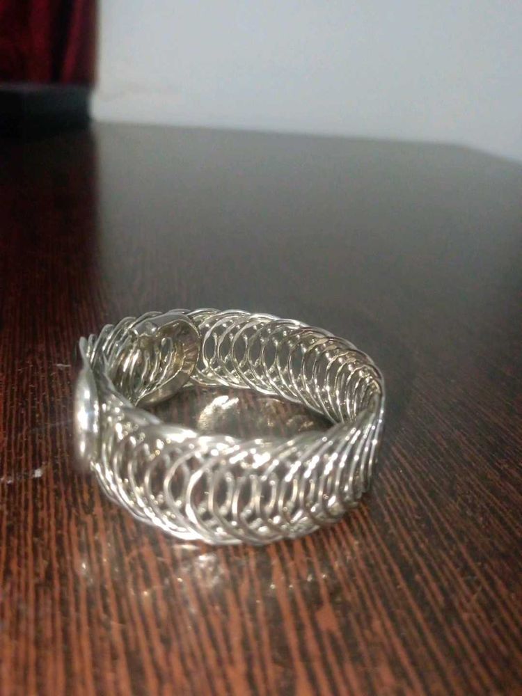 Silver Tone Spring Bracelet