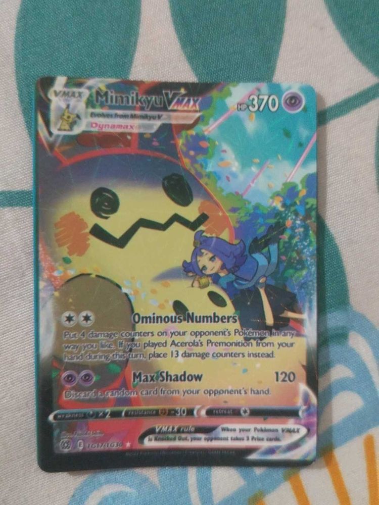 Pokemon card Mimikyu Vmax and regidrago V