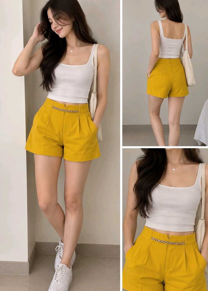 High-Waisted Yellow Shorts with Chain Detail